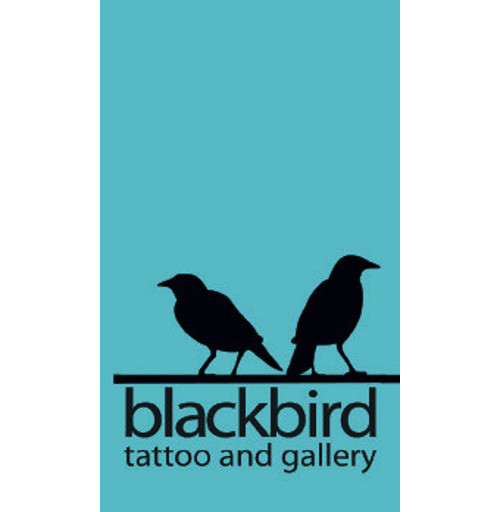 Front of business card for Blackbird Tattoo and Gallery.