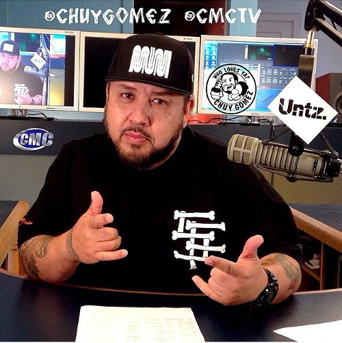Chuy Gomez and an Untz slap on his mic on his radio show at CMCTV.